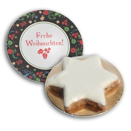 Zimtstern mittel auf Goldteller